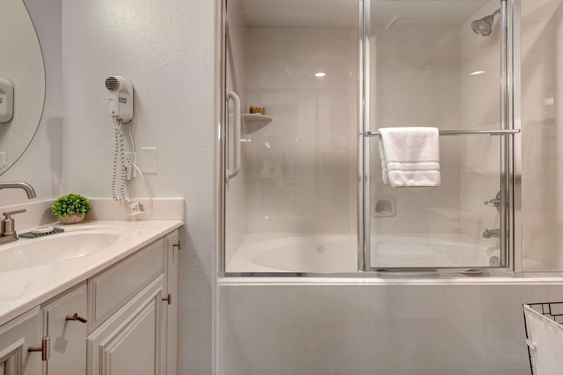 Shared full bathroom with tub/shower combo