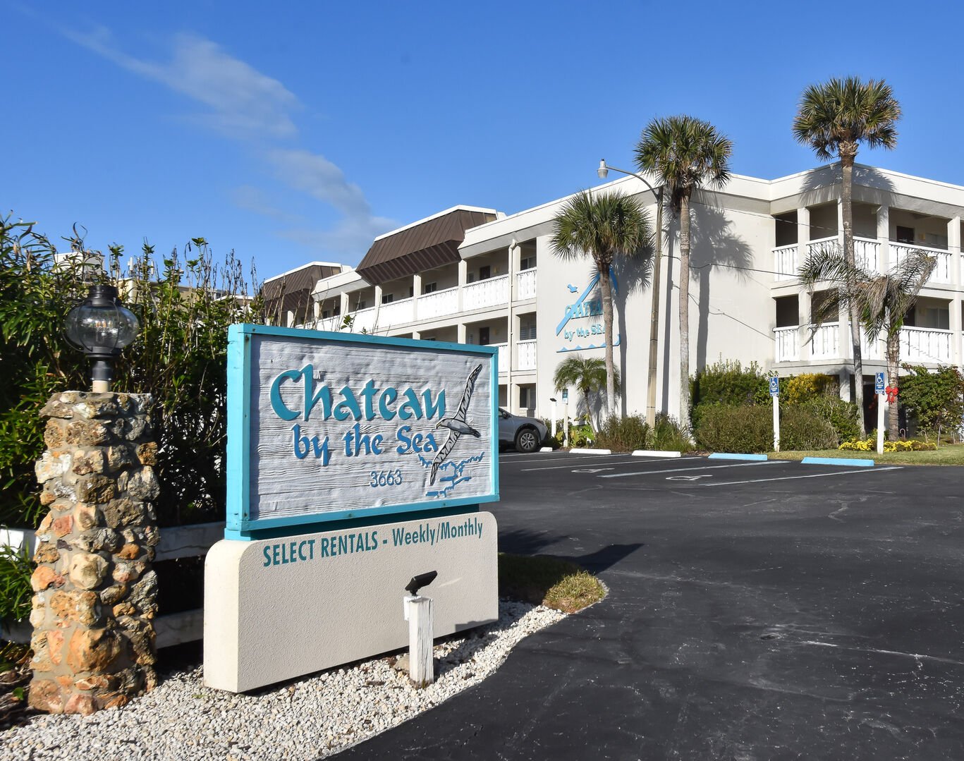 Chateau by the Sea sign and the building