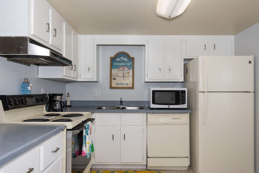 Kitchen with an oven and a refrigerator