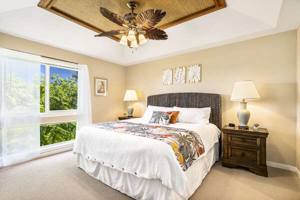 Main Bedroom with a King Bed and Views of the Tropical Fauna