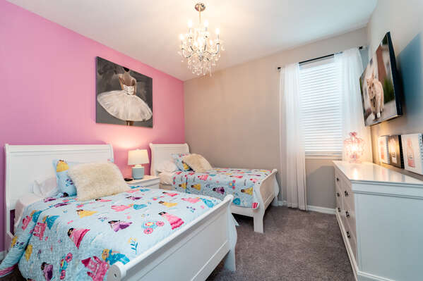 Bedroom 9 has a pretty theme that girls will love plus a wall mounted flatscreen TV