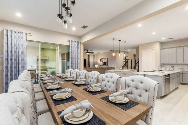 Dine at the formal dining table with seating for 12