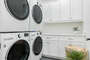 Two full-sized washer and dryers