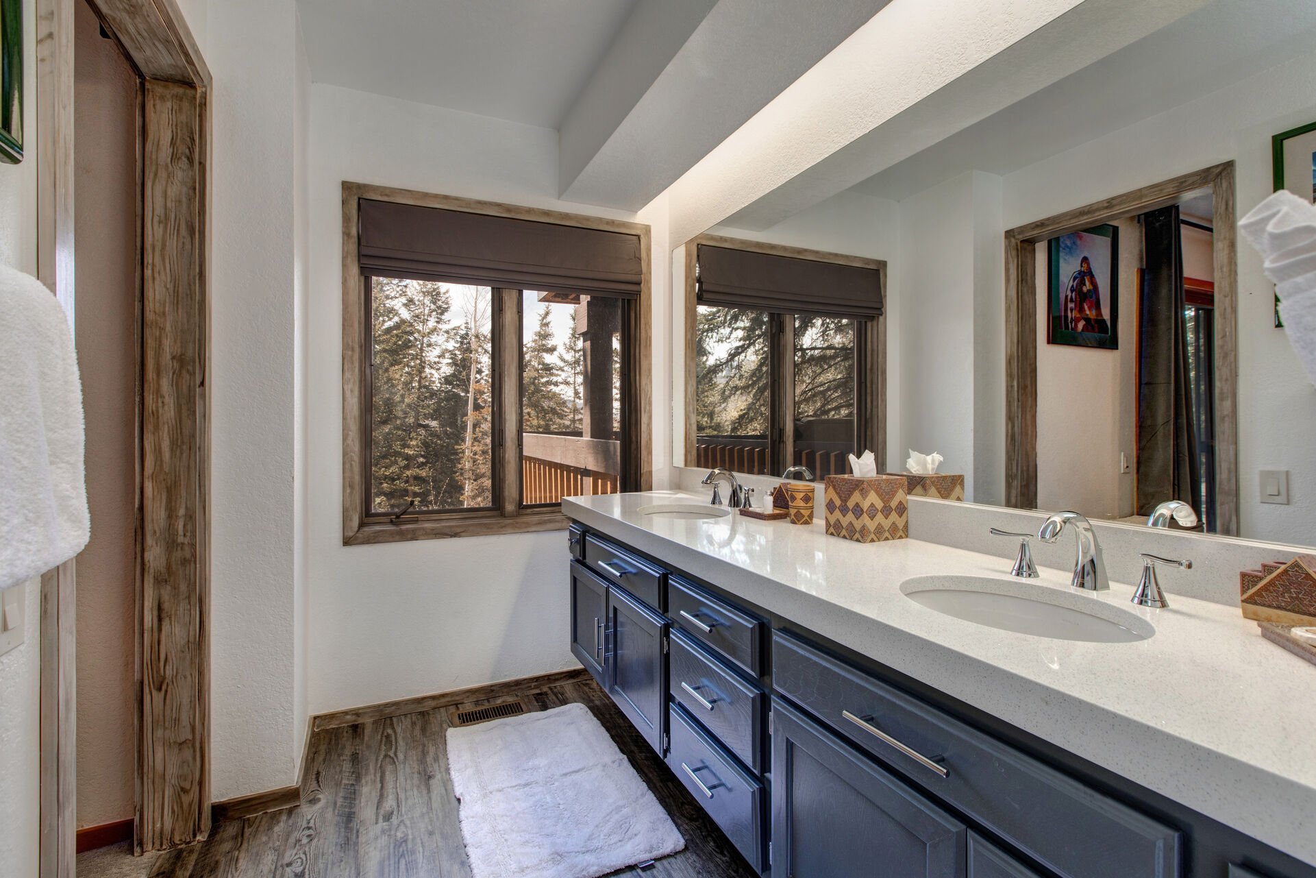 Master Bathroom with dual vanities, separate washroom and large tiled shower