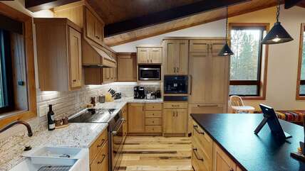 Side view of the kitchen highlighting the different appliances available during your stay.