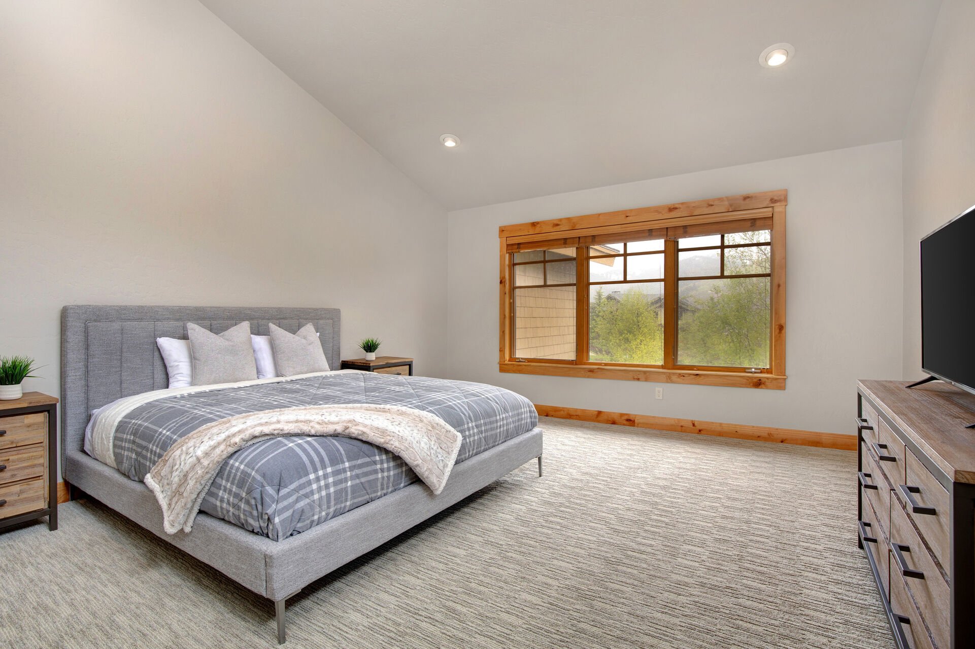 Upper Level Master Bedroom with a King Bed and Smart TV