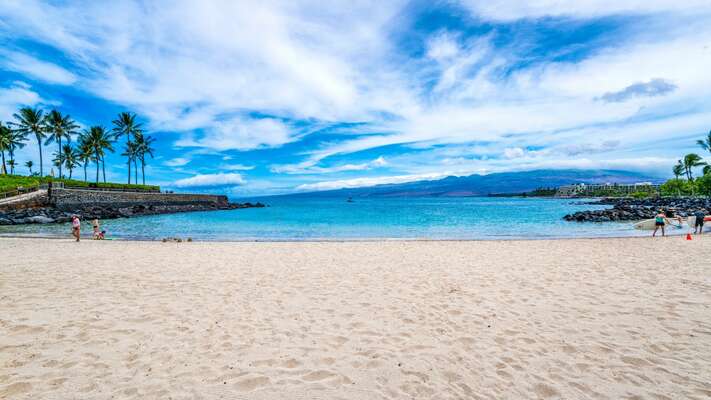 Access provided to exclusive Mauna Lani Beach Club and the pristine white sand beach