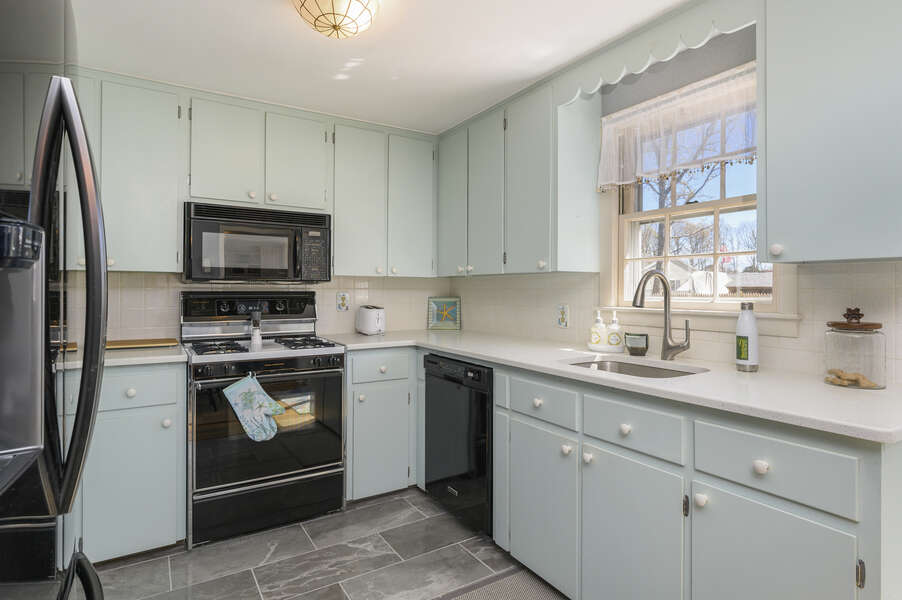 Fun kitchen with light blue cabinetry - 7 Cutter Lane West Yarmouth Cape Cod - New England Vacation Rentals