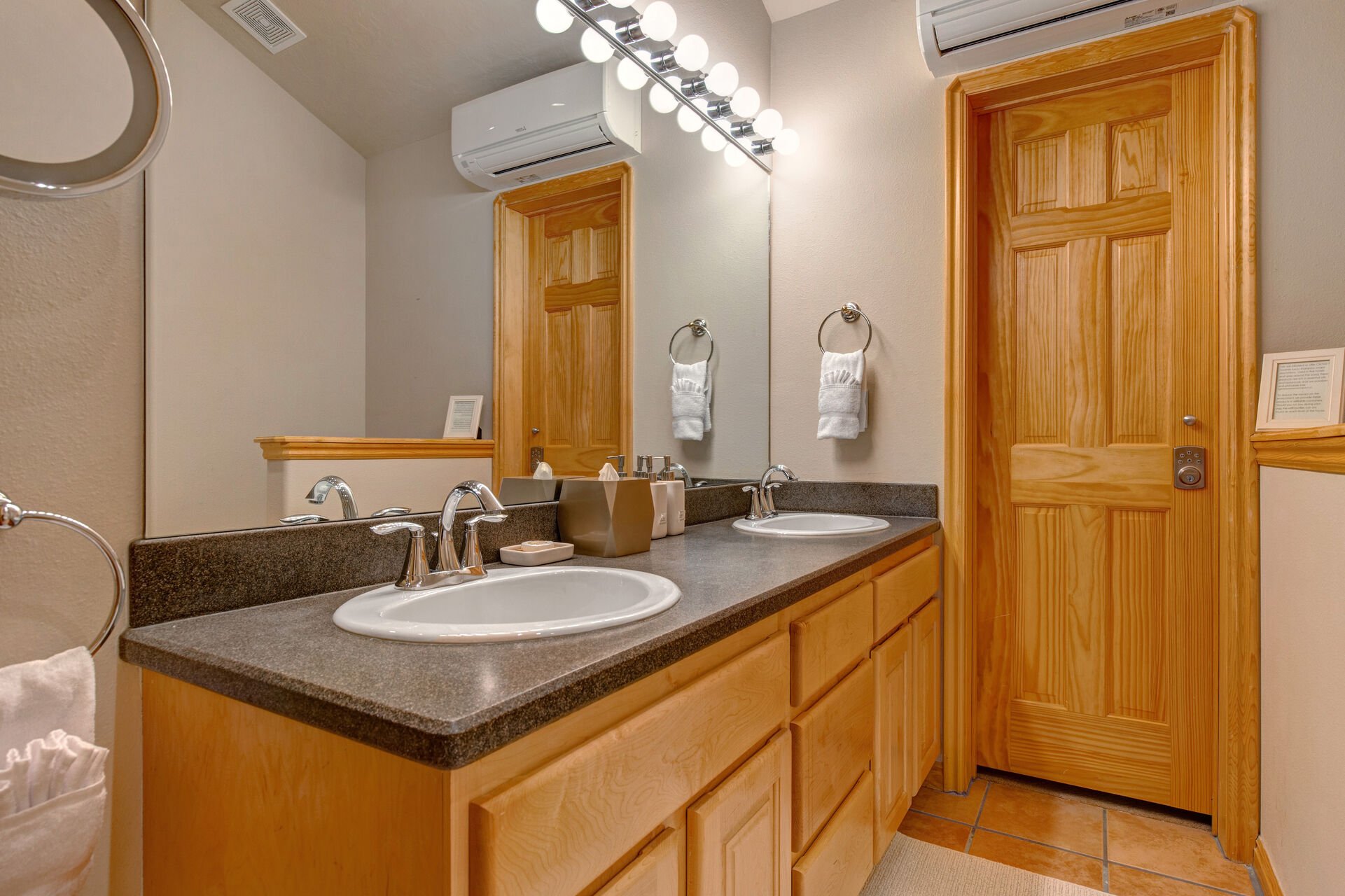Upper Level Master Suite Bathroom, jetted tub, and separate tiled shower