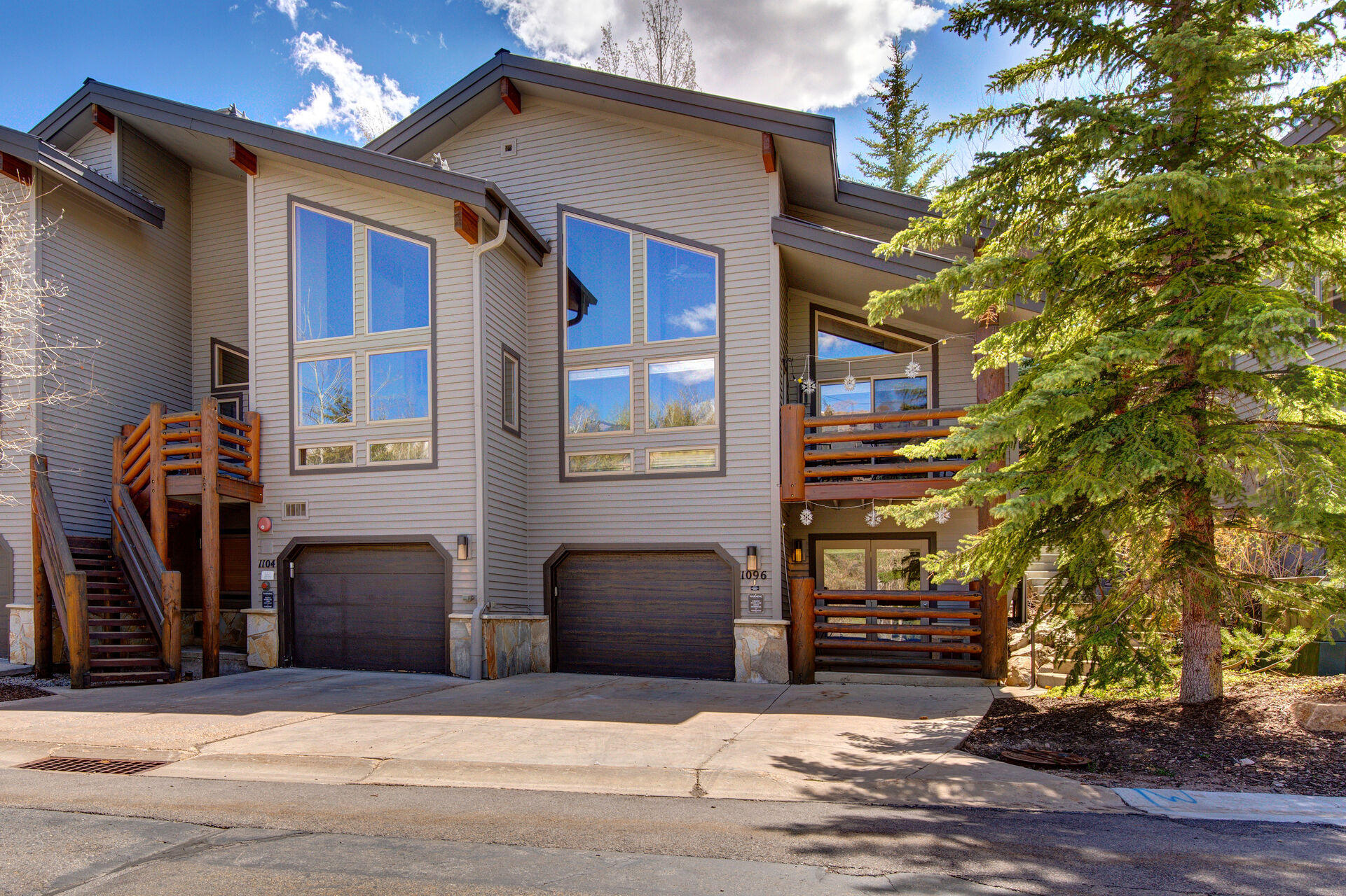 Front Exterior with one-car garage and room for two extra vehicles in driveway