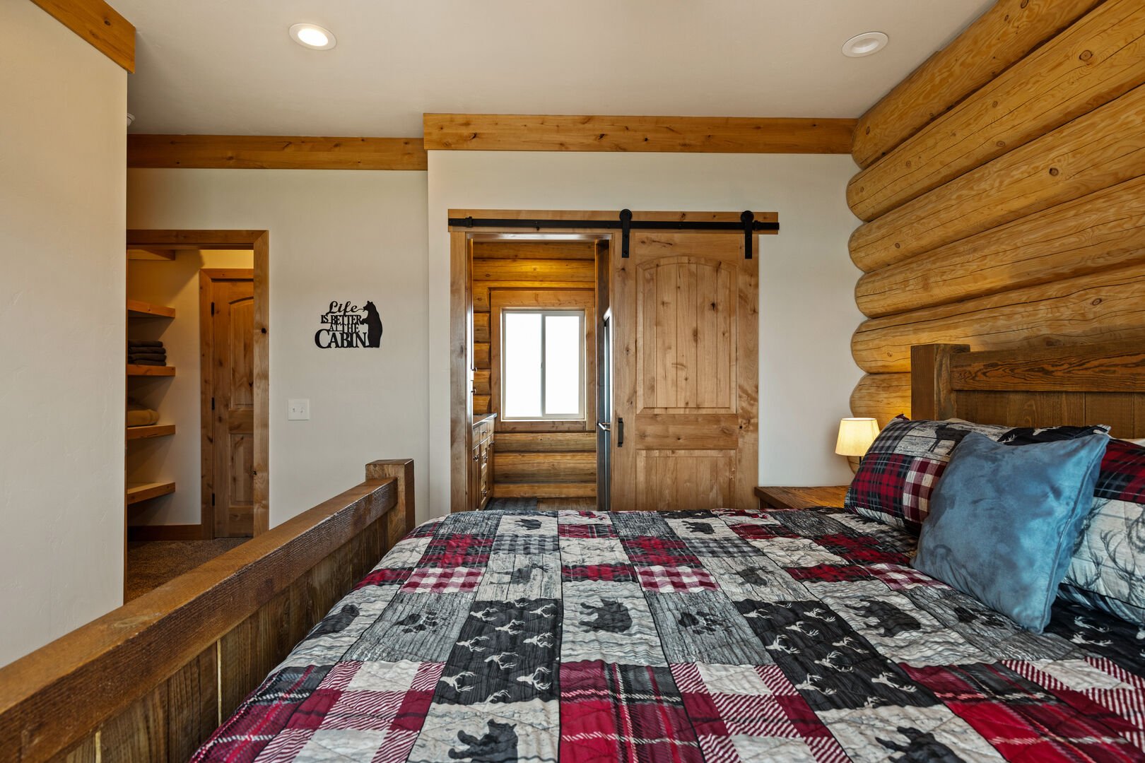Stone Skipper Lodge ~ master bedroom #1 on main level w/ king bed and private ensuite bathroom