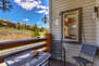 Main Level Private deck with small table, seating for four, and beautiful surrounding views