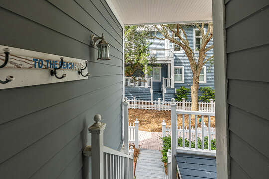 The backdoor leads to the grill and walkway towards Coast Cottages pools.