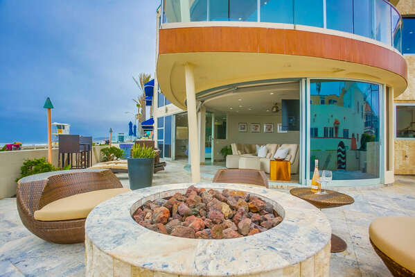 Ground Floor Oceanfront Patio w/ Fire Pit, Loungers, & Outdoor Dining