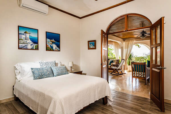 Enjoy easy access to the patio from Bedroom 5.