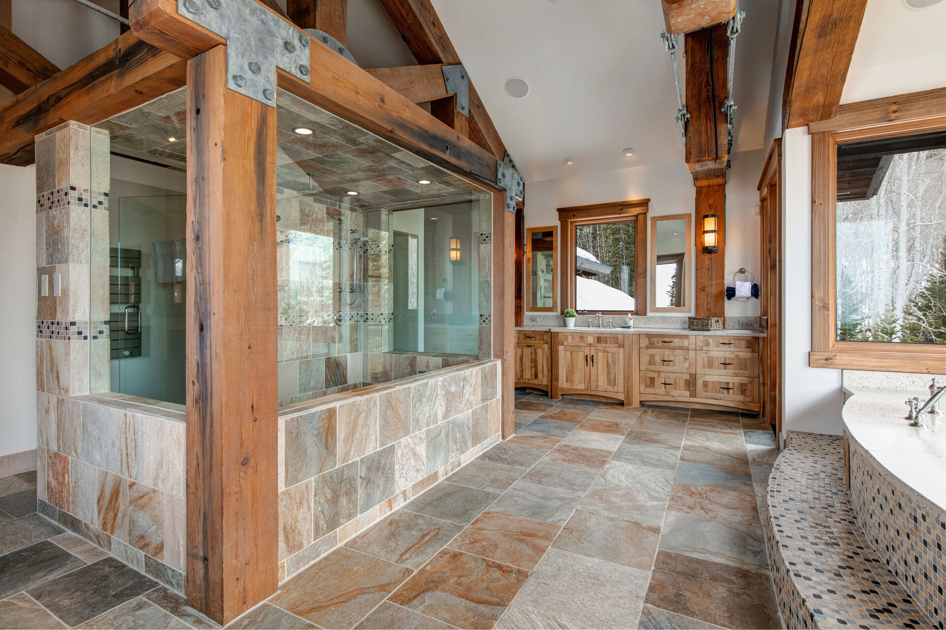 Master Bathroom with soaking tub, glass and tile shower, double vanities and private balcony