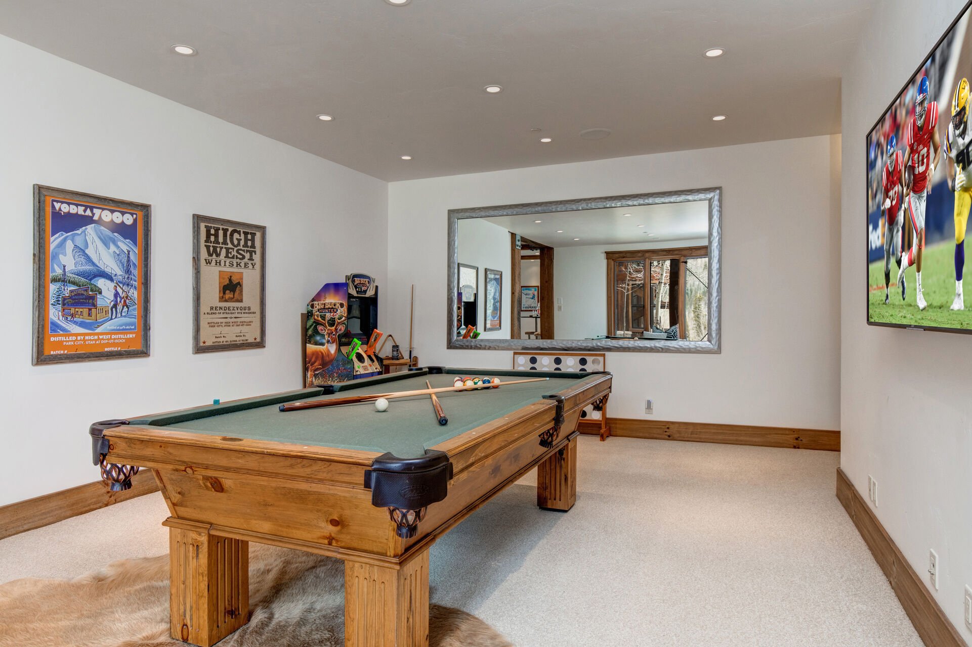 Garage level billiard area and access to Jack and Jill bathroom