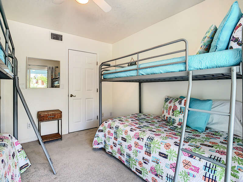 4 bunkbeds and a nightstand and walk-in closet.