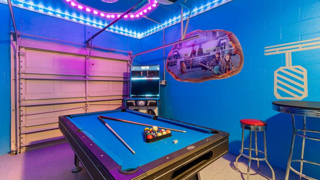 Game Room (Angle)
Pool table 
Foosball
Men In Black Video Arcade