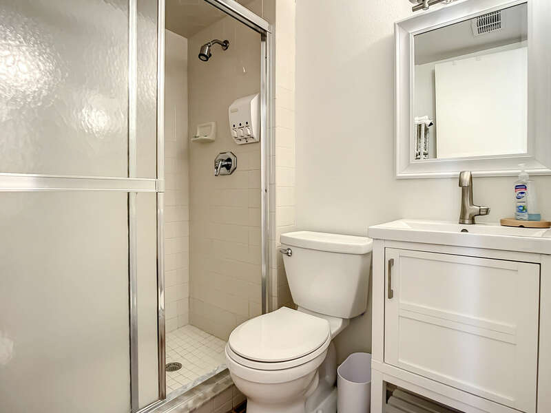 Guest bathroom with walk in shower.