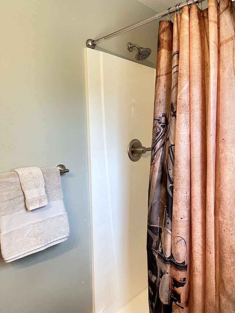Bathroom featuring walk-in Shower