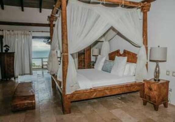 Villa Tierra - The master bedroom with access to the terrace