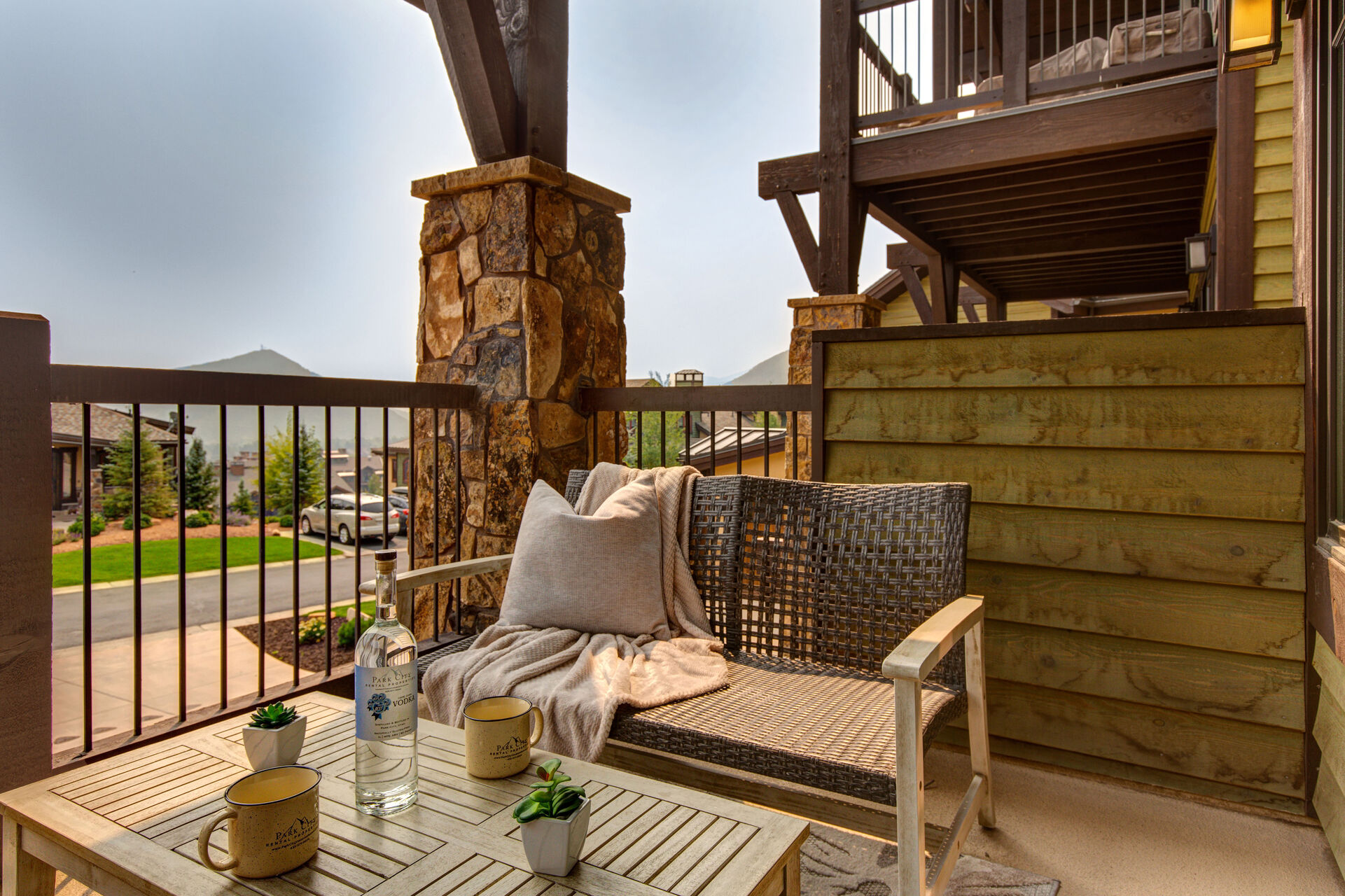 Private patio off Living Room with comfortable seating for four and breathtaking surrounding views of Canyons Resort and golf course