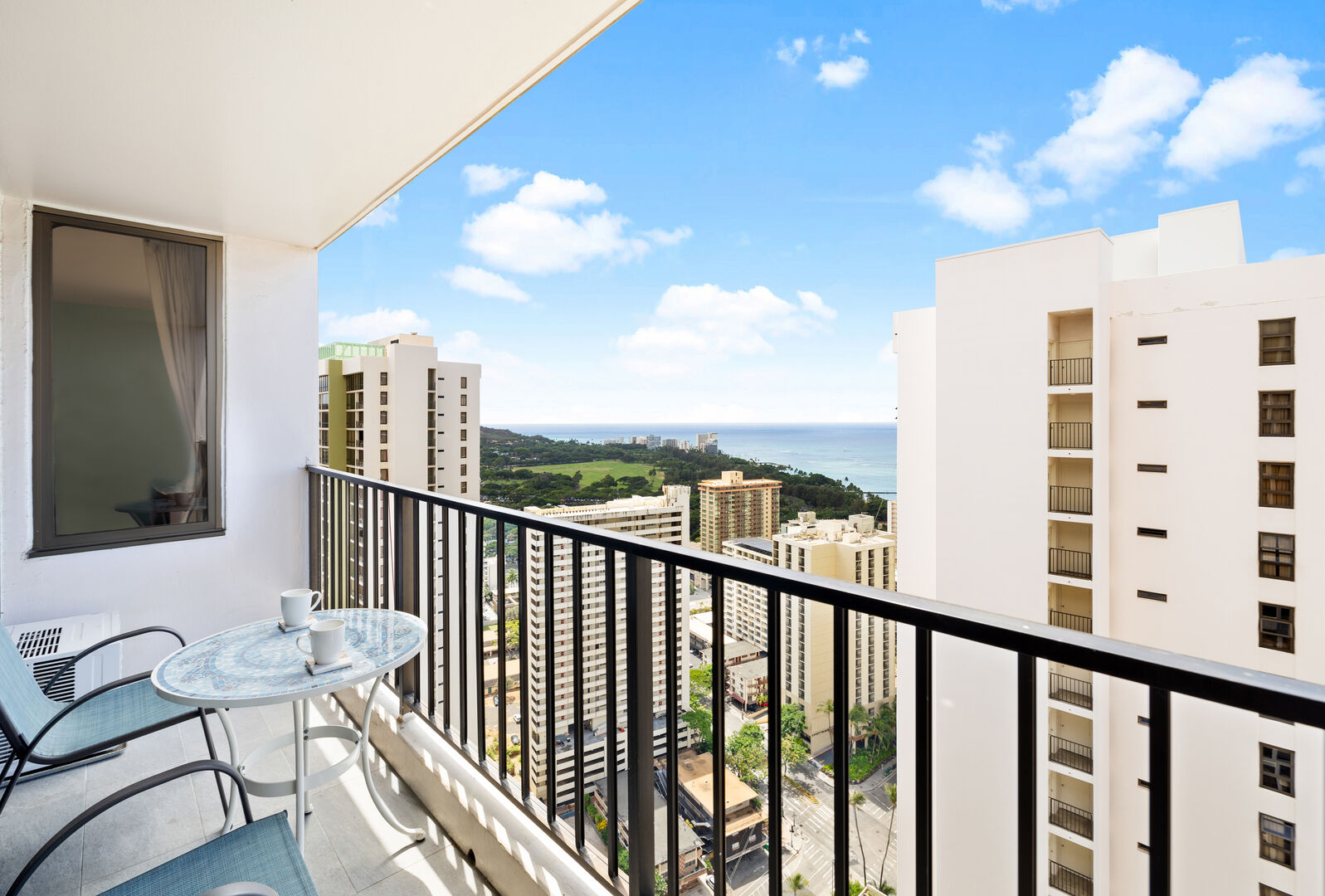 Enjoy the refreshing views of the ocean and city from your balcony!