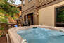 Private Hot Tub Patio off dining area with BBQ grill, seating and table for two