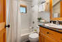 Upper Level shared full bathroom with tub/shower combo