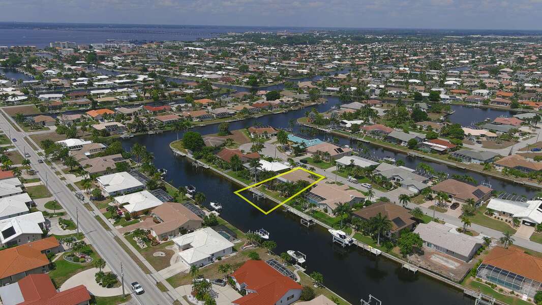 Aerial of house on canal