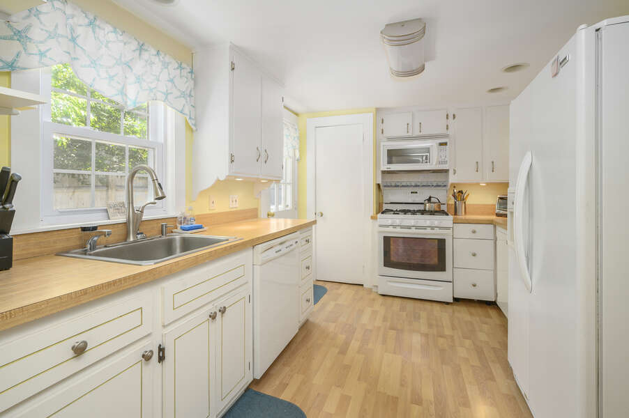 Galley style kitchen with 2nd Fridge, stove , second microwave, second dishwasher-21 Pine Street- Harwichport- Cape Cod- New England Vacation Rentals