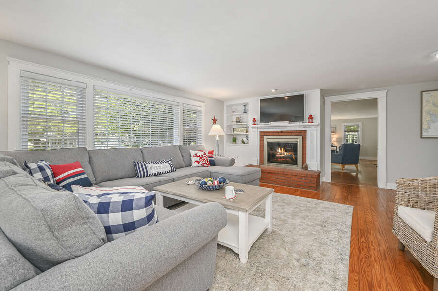 Family room with wrap around couch , flat screen tv-21 Pine Street- Harwichport- Cape Cod- New England Vacation Rentals
