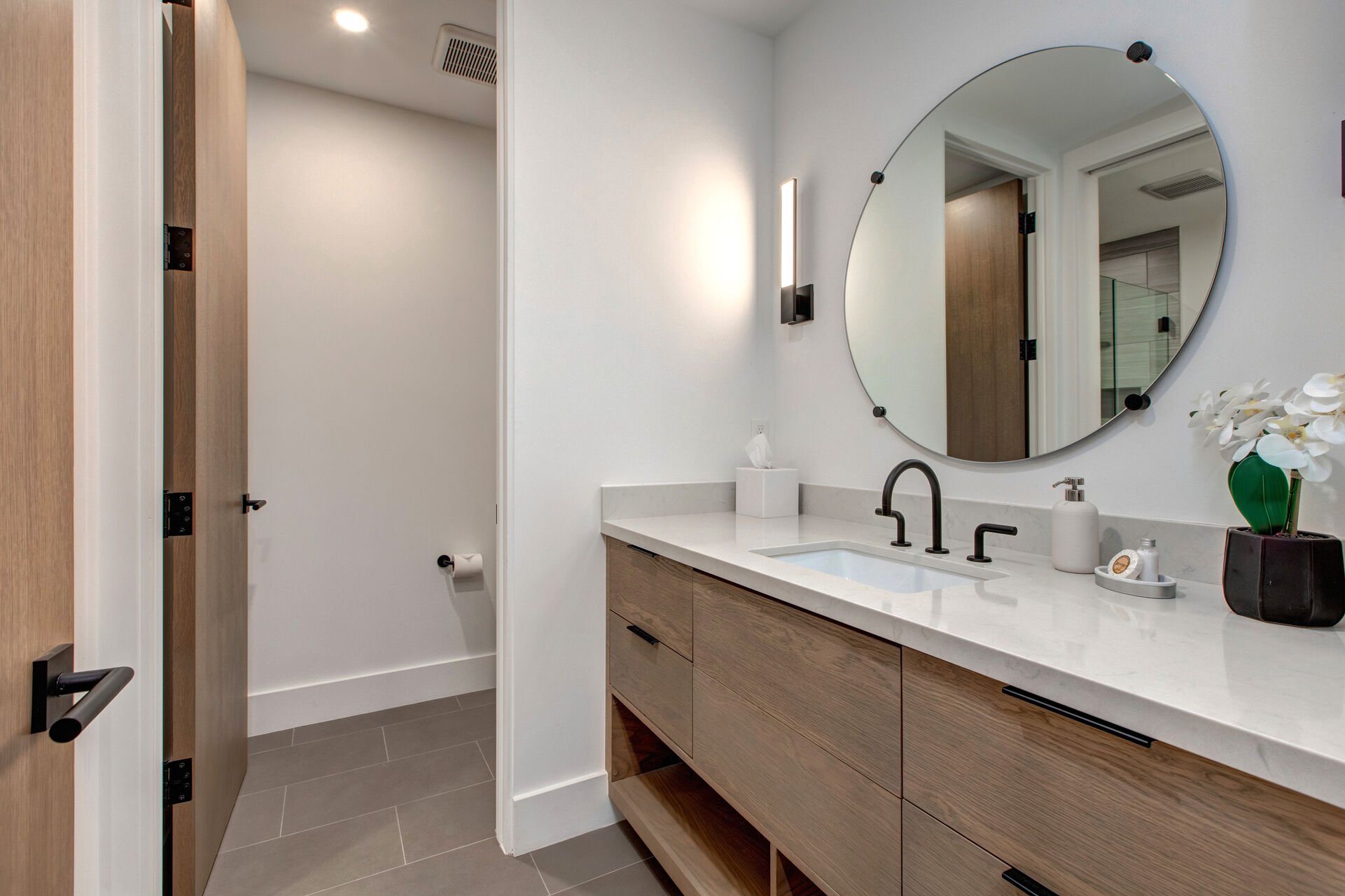 Shared Bath with Separate Vanities and Water Closet
