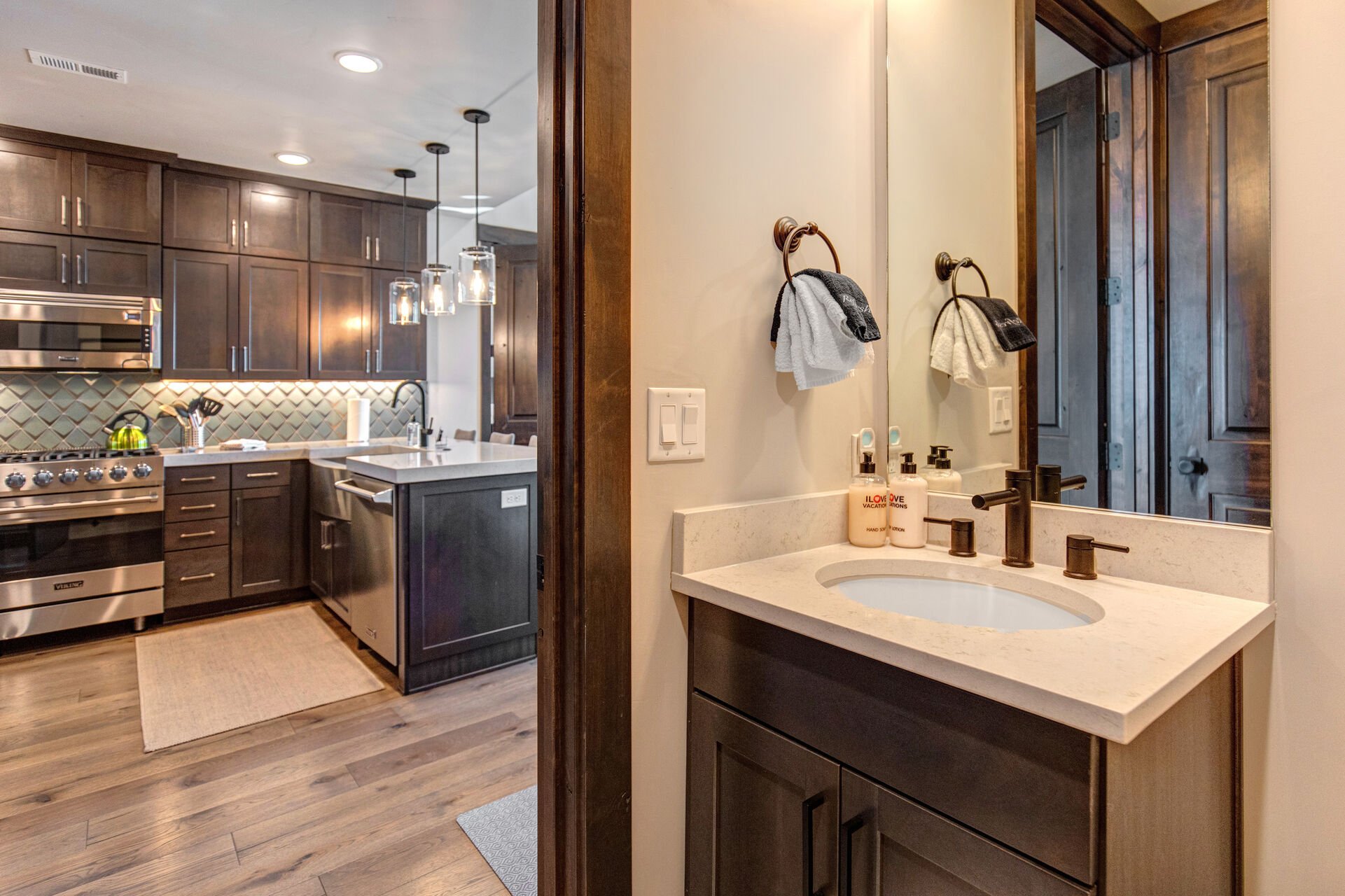 Main Living Area powder room with full-sized washer/dryer unit