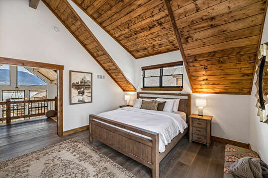 Upper level master bedroom that opens to the loft