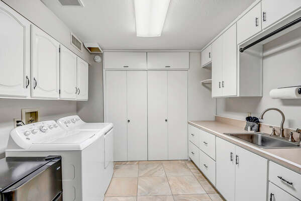 Large Laundry Room with Full Size Washer and Dryer and Mini Fridge