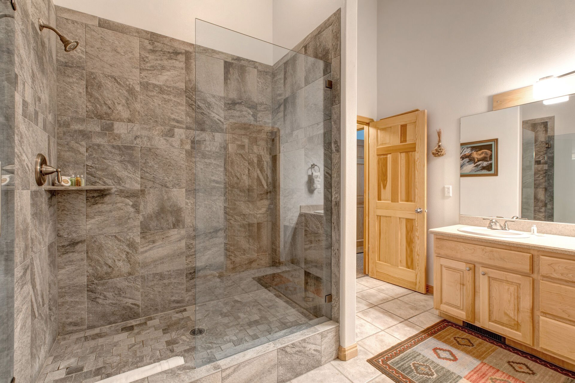 Master Bathroom with over-sized tile shower, and dual vanities