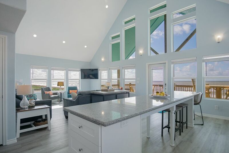Kitchen overlooking the living area with ocean view