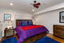 Main Level Bedroom 2 with king bed, smart tv, and en suite, jack-n-jill access, full bathroom