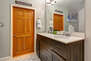 Master Bathroom with dual vanities and over-sized tiled shower