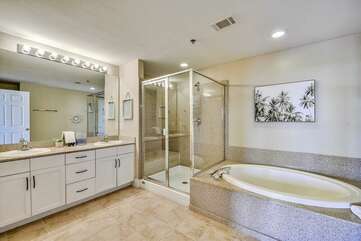 Master bathroom with garden tub and shower with his/her sink
