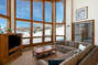 Your large, comfortable living room with sliding door to the deck