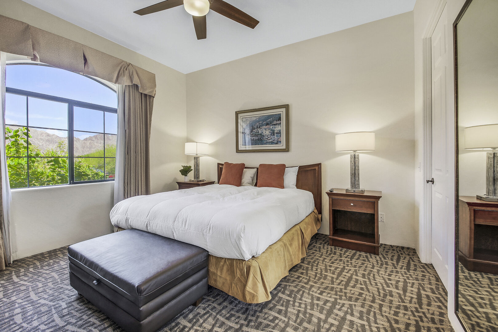 Master Suite 1 features King-sized Bed, 55-inch Samsung Smart television.