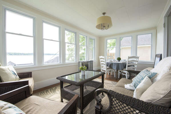 Sitting area in the back sunroom with gorgeous views of Cayuga Lake... Rent a Kayak or Pontoon Boat from a nearby marina!