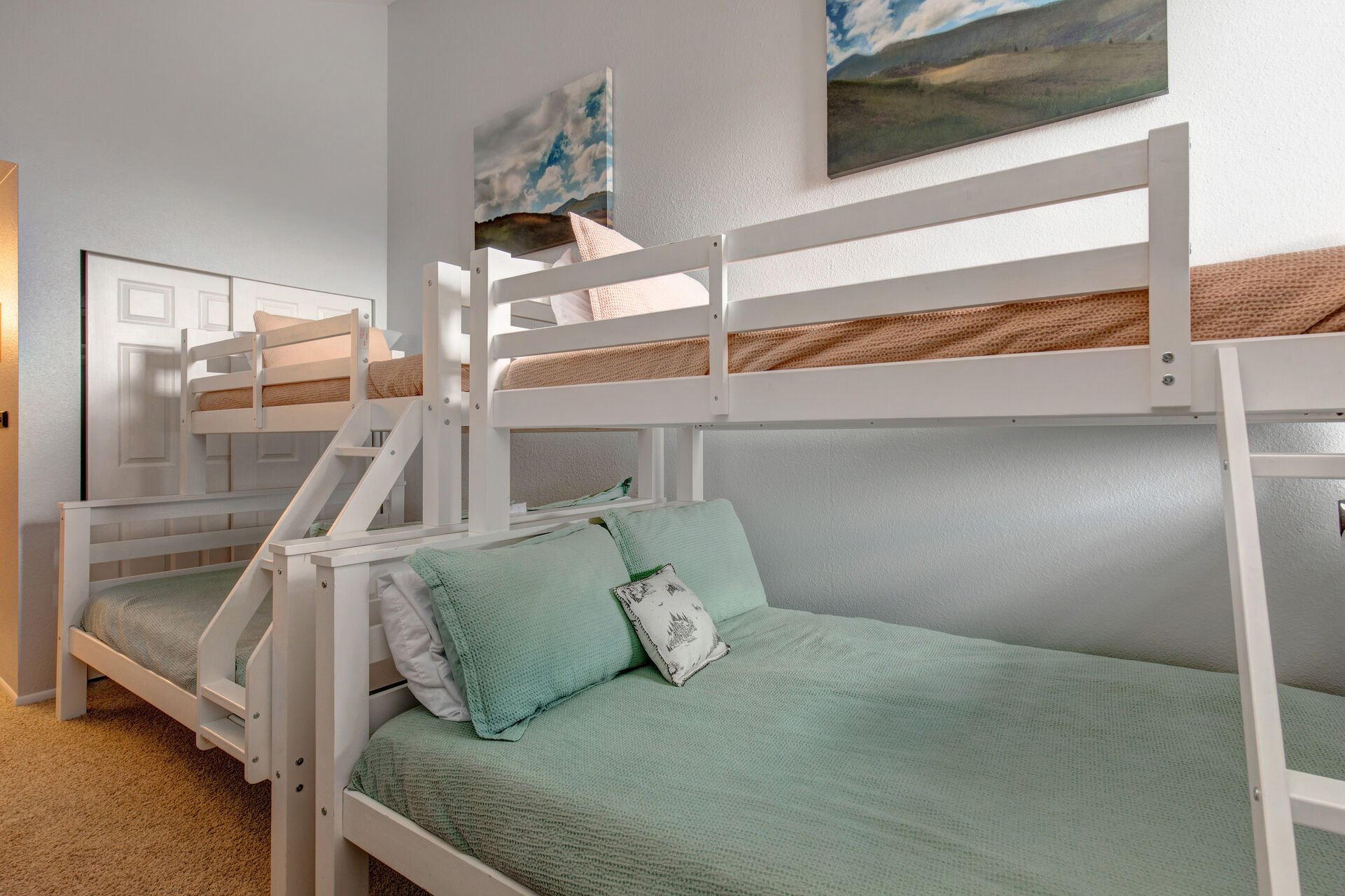 Upper Level Loft bunk area with two twin over full bunk beds and access to full bath