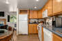 Fully Equipped Kitchen with Frigidaire appliances, ample counter-space, and comfortable dining area with seating for 6