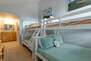 Upper Level Loft bunk area with two twin over full bunk beds and access to full bath