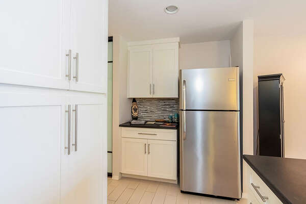 Kitchen is well-equipped with updated appliances