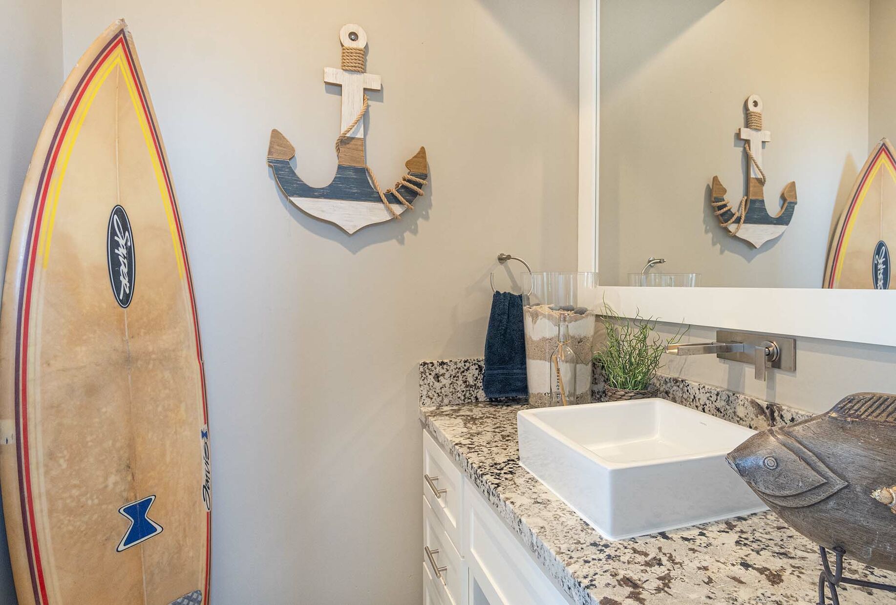 Surf and more. Bathroom detail.